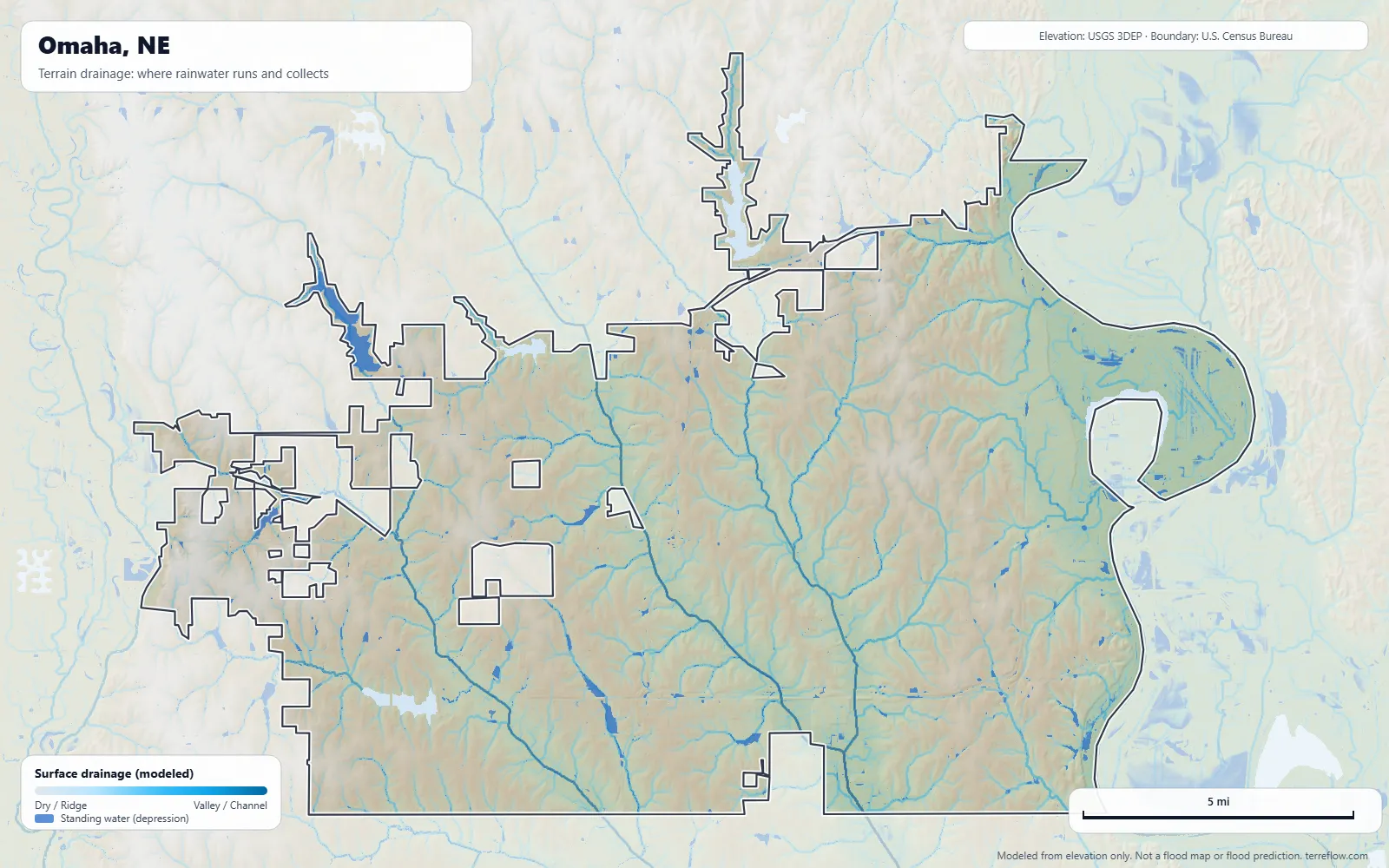 Terrain drainage map of Omaha, NE: modeled paths where rainwater runs and collects, from USGS 3DEP elevation data, with the city boundary
